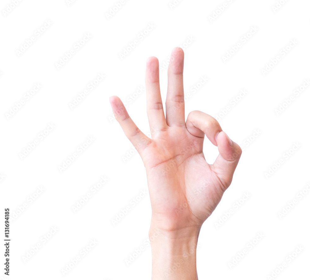 Young man hand OK sign with white background Young man hand OK sign with white background