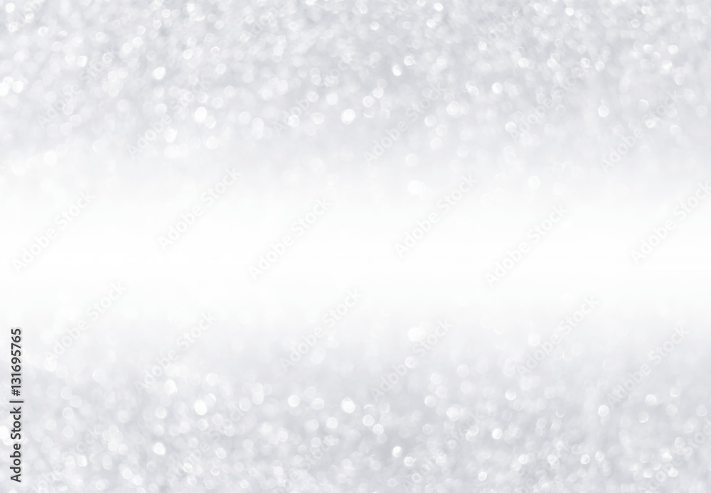 silver glitter bokeh from fresh snow abstract texture background