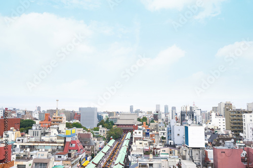 Business and culture concept - panoramic modern city skyline bird eye aerial view with Sensoji-ji Temple shrine - Asakusa district under morning blue sky in Tokyo, Japan