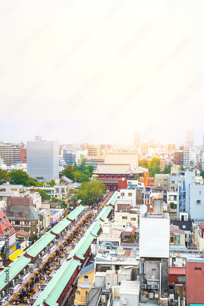 Fototapeta premium Asia Business concept for real estate and corporate construction - panoramic modern cityscape building bird eye aerial view of Sensoji shrine under sunrise and morning blue bright sky in Tokyo, Japan