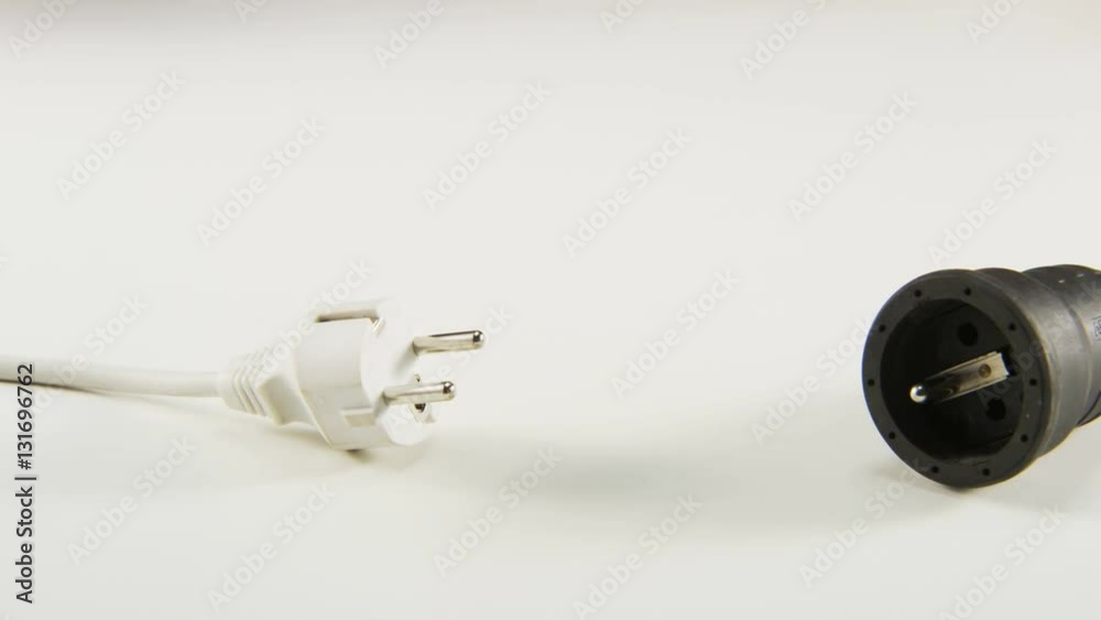 Unplugging White Cable From an Extension Cord Unplugging White Cable From an Extension Cord