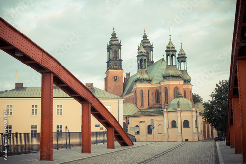Poznan, Poland - June 29, 2016: Vintage photo, Old bridge and cathedral church in town Poznan