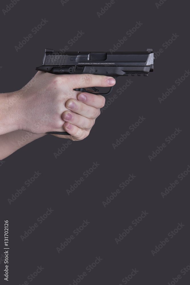 Armed man with semiautomatic in home invasion scenario StockFoto