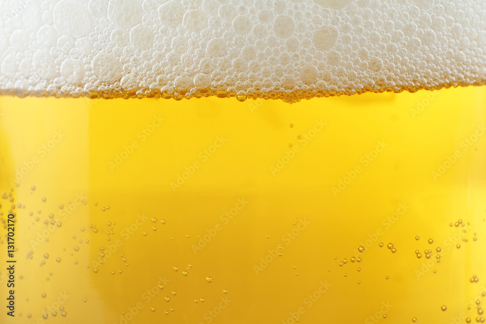 Beer background, foam bubbles. Close-up. Beer background, foam bubbles. Close-up.