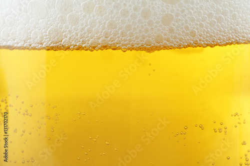 Beer background, foam bubbles. Close-up.