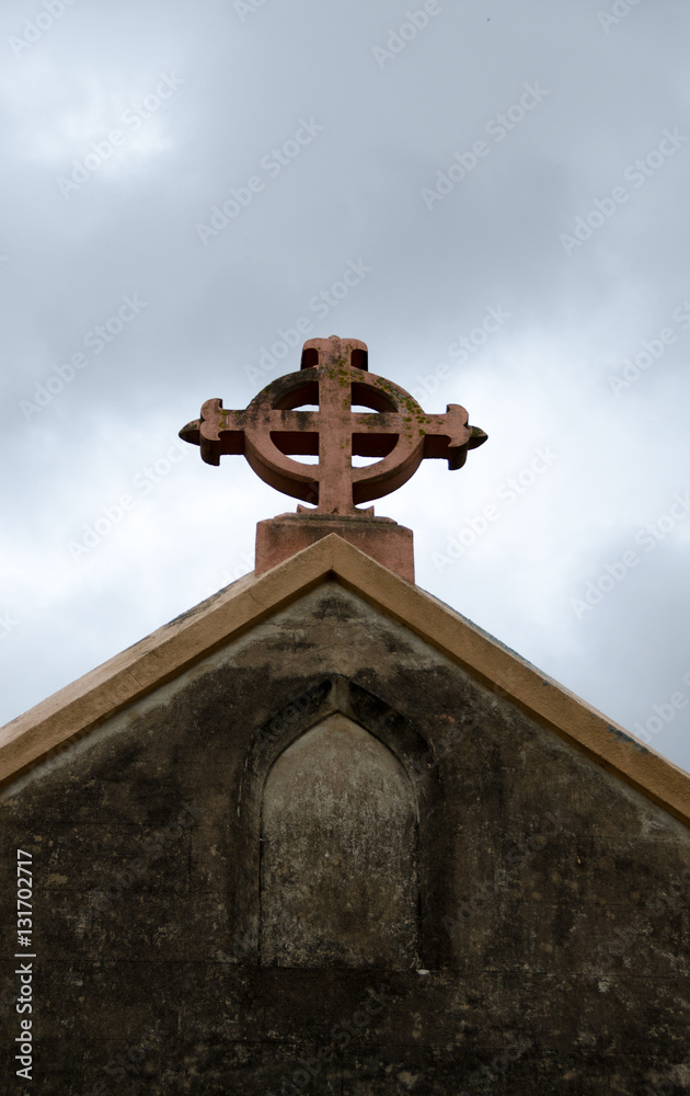 Cross symbol on roof of church