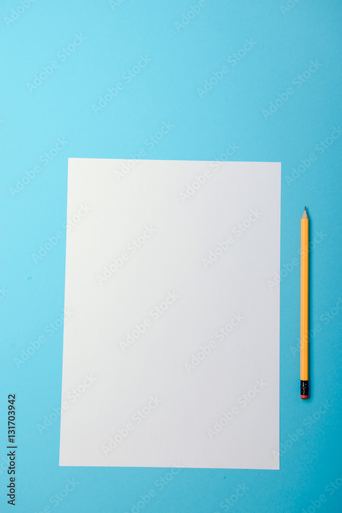 Blank paper and yellow pencils Blank paper and yellow pencils