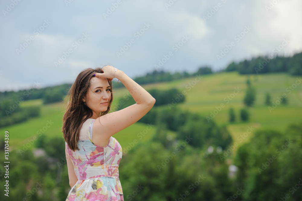 Brunette girl enjoying journey in mountains. Brunette girl enjoying journey in mountains.