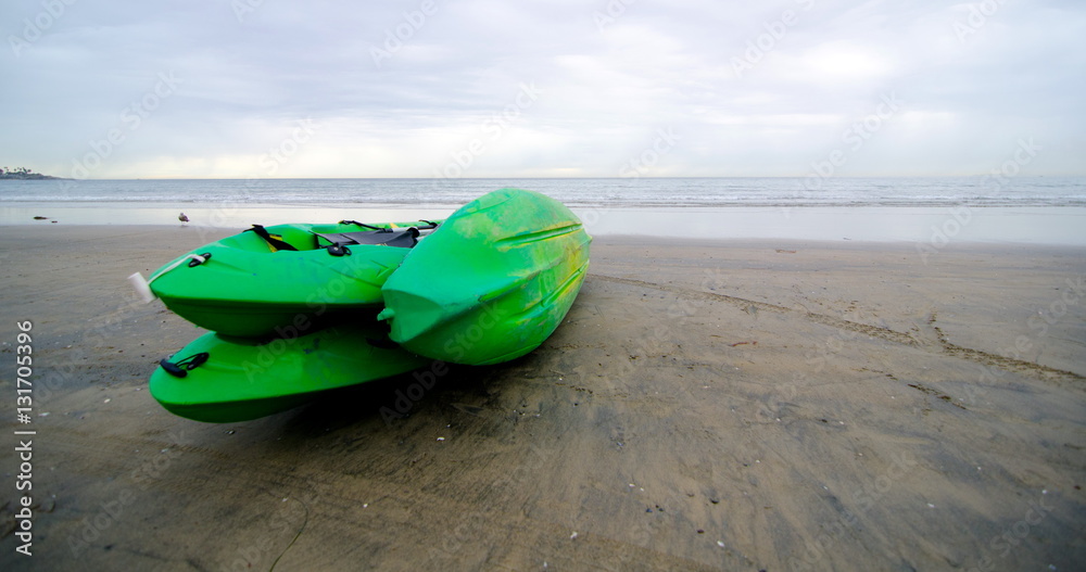 Green canoes at La Jolla Bay