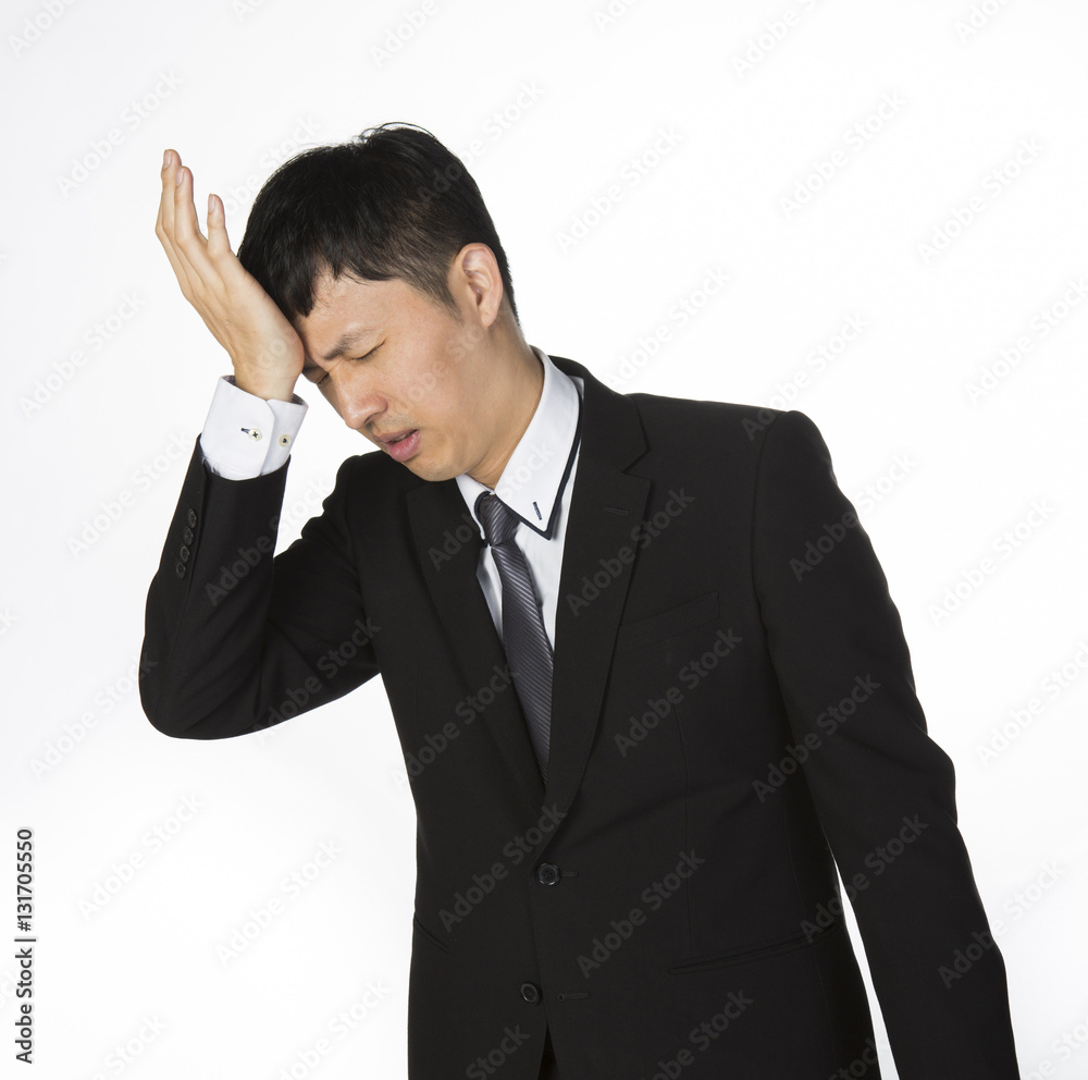 Businessman suffering from headache