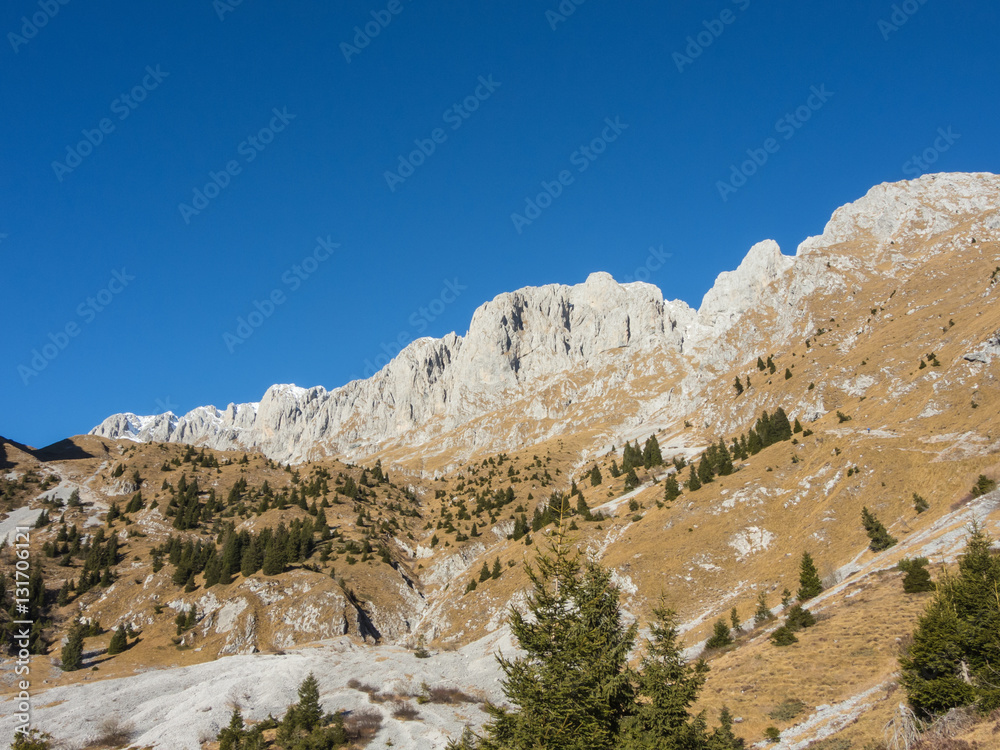 Presolana is a mountain range of the Bergamo Prealps. Orobie landscape in winter dry season without snow.