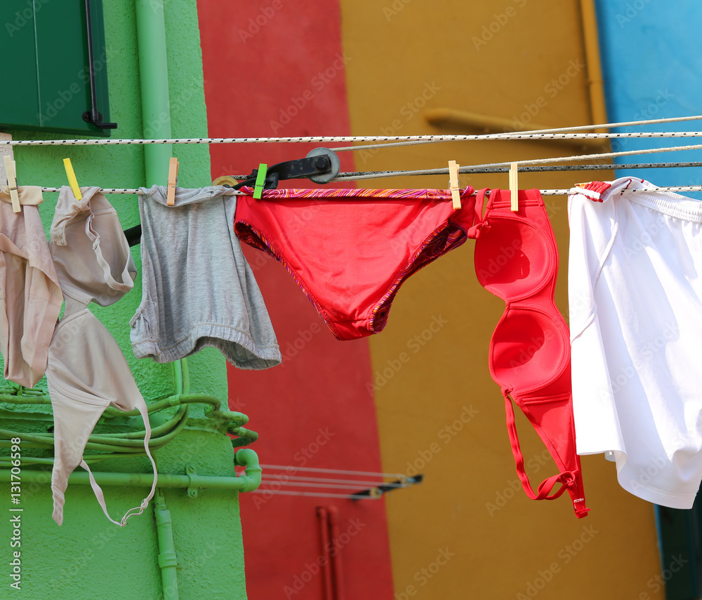 Foto de underwear for women with bras and panties hanging do Stock