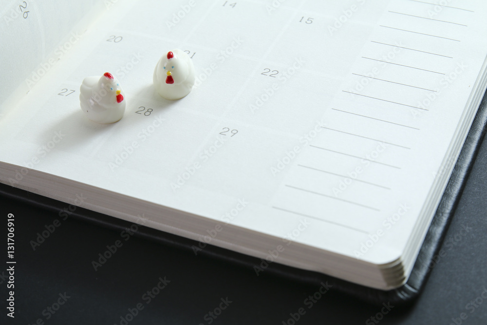 Chinese new year decorations on planner with focus on chinese new year date for year 2017 Chinese new year decorations on planner with focus on chinese new year date for year 2017