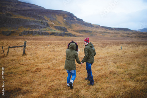 Walking Couple in Field