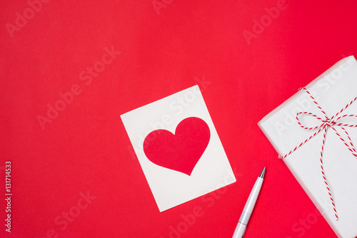Valentines Day gift box and greeting card isolated on color back