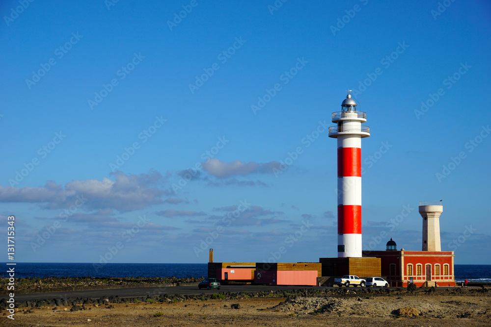 Red and white lighthouse of El Cotillo Canary Islands, Fuerteventura.
Red and white lighthouse of El Cotillo Canary Islands, Fuerteventura.