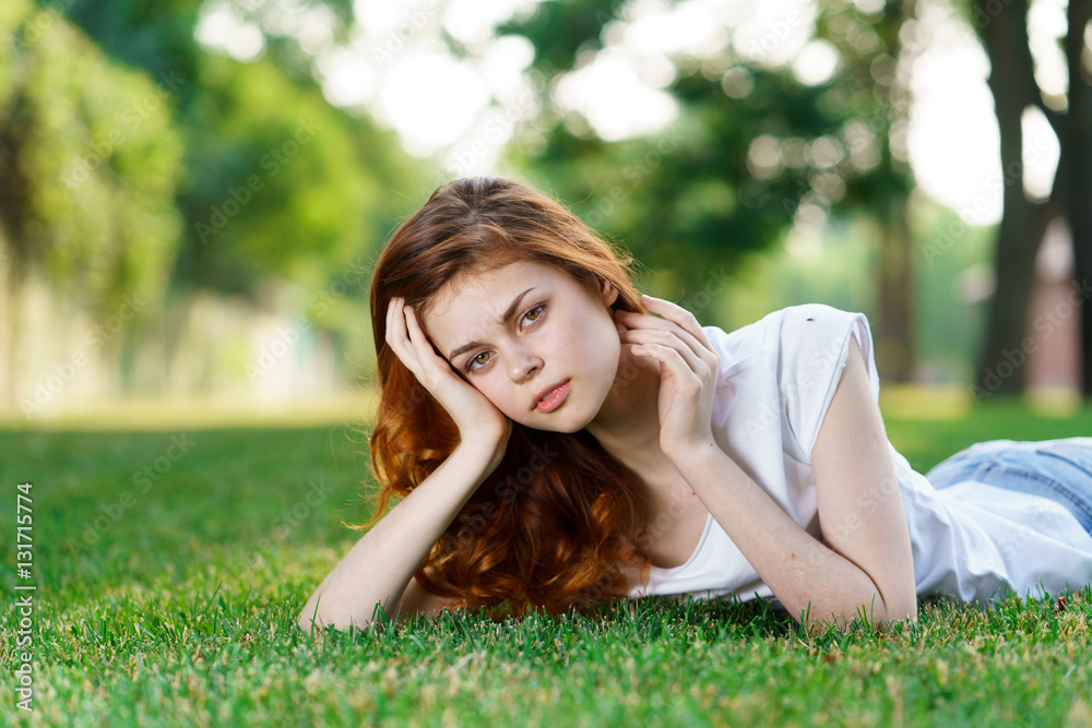 lovely woman in white t-shirt resting on green grass in parklovely woman in white t-shirt resting on green grass in park lovely woman in white t-shirt resting on green grass in parklovely woman in white t-shirt resting on green grass in park