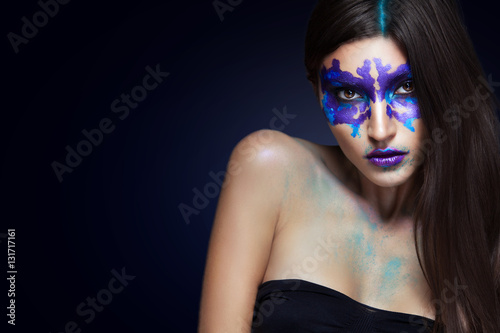 Beauty portrait of the girl with Rorschach test on her face. Music Album Cover.