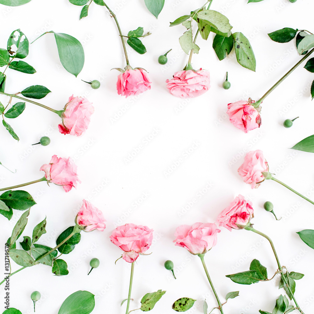 Obraz premium Frame made of pink roses on white background. Flat lay, top view. Valentine's background