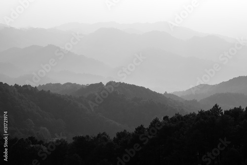 A black & white of a layer of mountain.