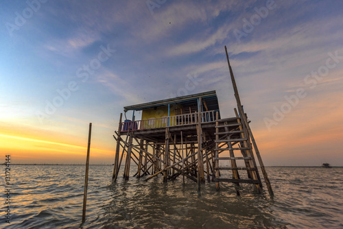 Living Hut at the sea in Sunset scenery