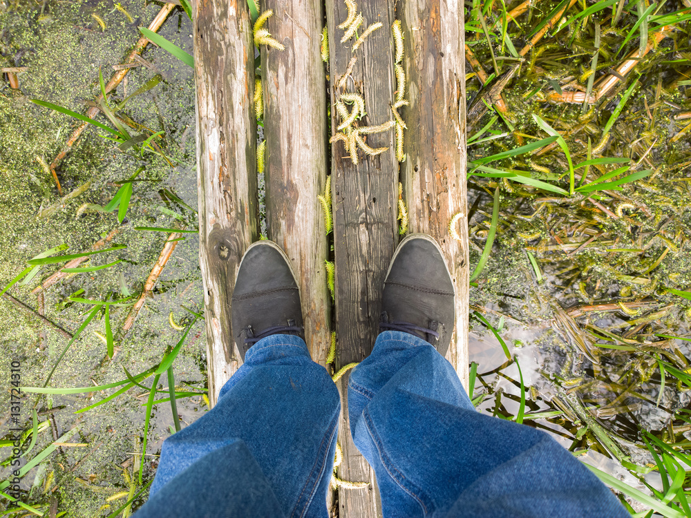 Fototapeta premium Feet on the river.