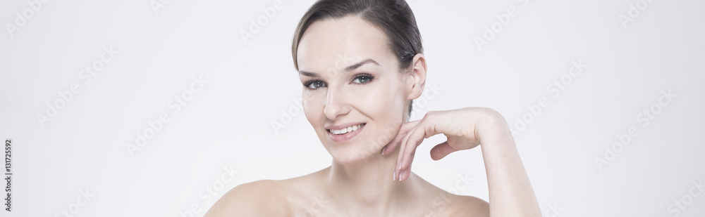 Smiling brunette in natural make-up