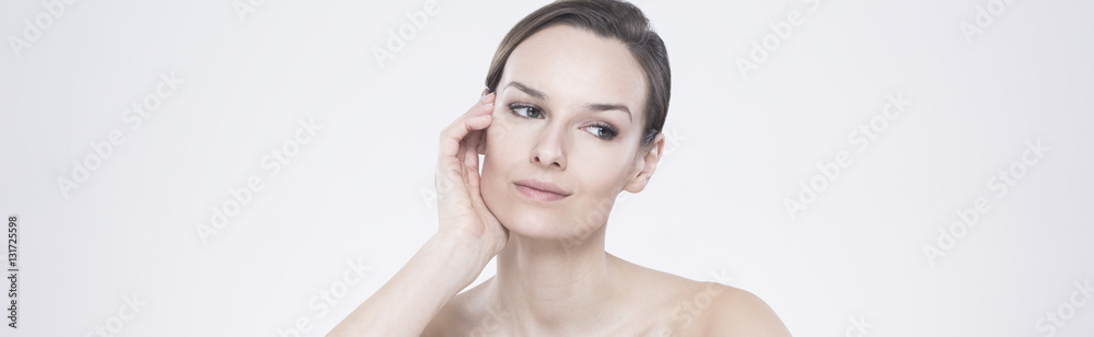 Thoughtful woman wearing natural make-up