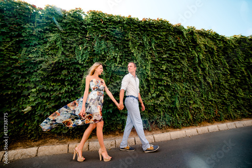 Couple walking in the city of Denia, Spain on summer day © bodiaphoto