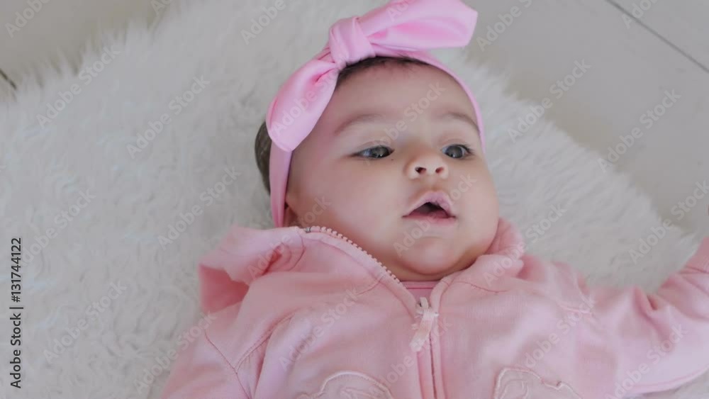 Little kid smiling at camera