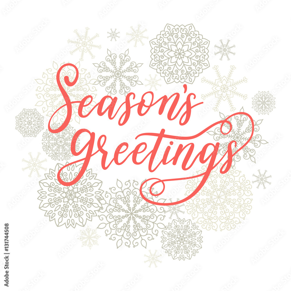Season's Greetings card. Vector winter holiday background with hand lettering calligraphy, snowflakes, falling snow.