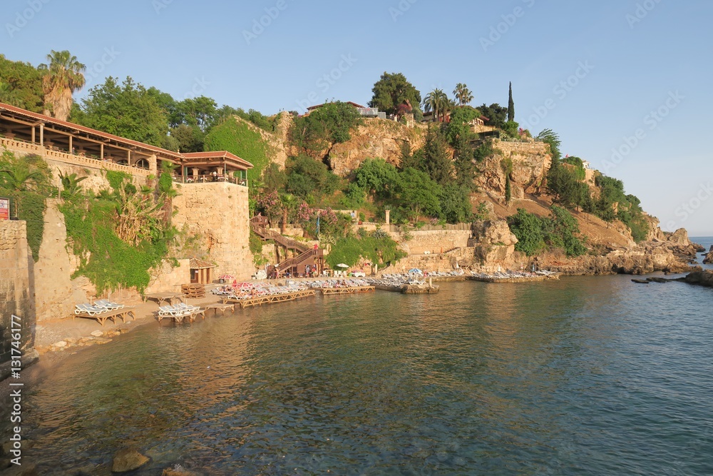 Mermerli Beach and Restaurant with the City Walls in Antalyas Oldtown Kaleici, Turkey