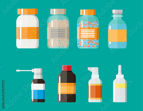 Set of medicine bottles with labels and pills