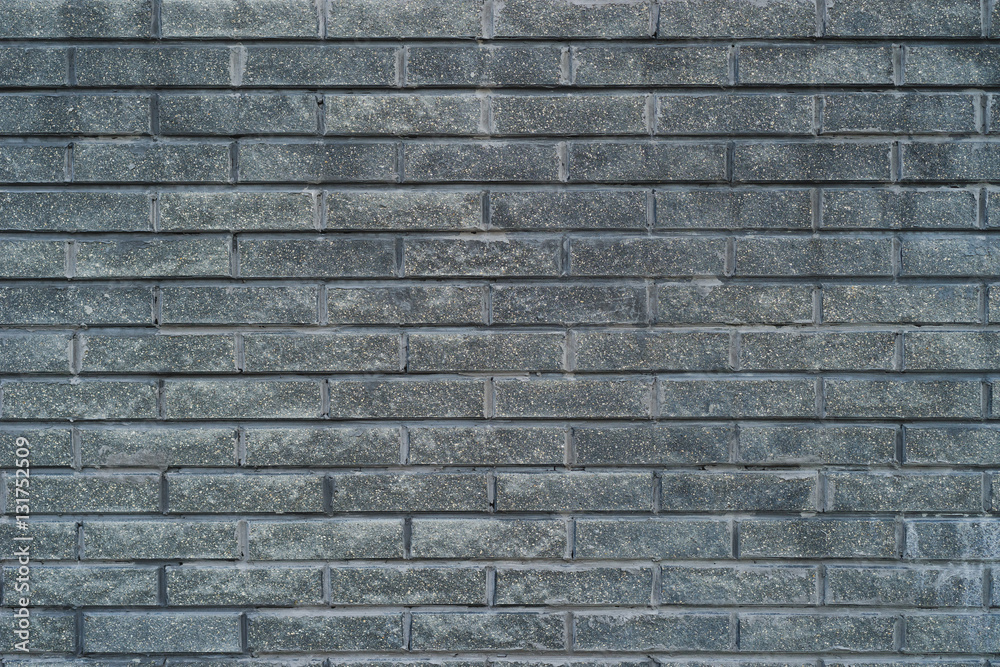 Gray brick wall texture. Background with copy space.
