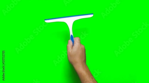 Male hand swiping screen with squeegee
