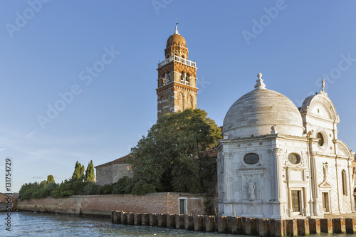 San Michele cemetery church in Venice at sunset, Italy.