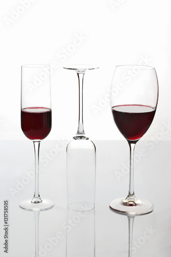 glasses with red wine on a light background