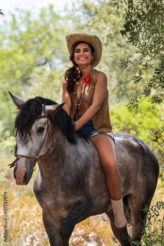 Beautiful girl and horse in nature