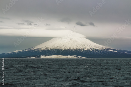 island of the Kuril Islands of Kunashir with the volcano a tyatya