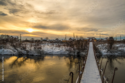 sunset on the river bridge