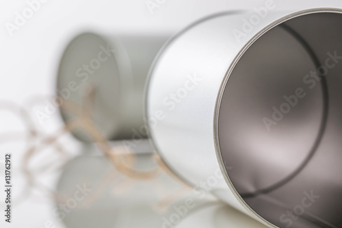 Tin cans telephone on white background