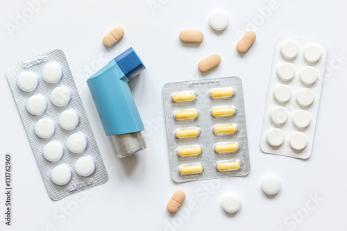 Photography concept asthma and treatment on white background top view
