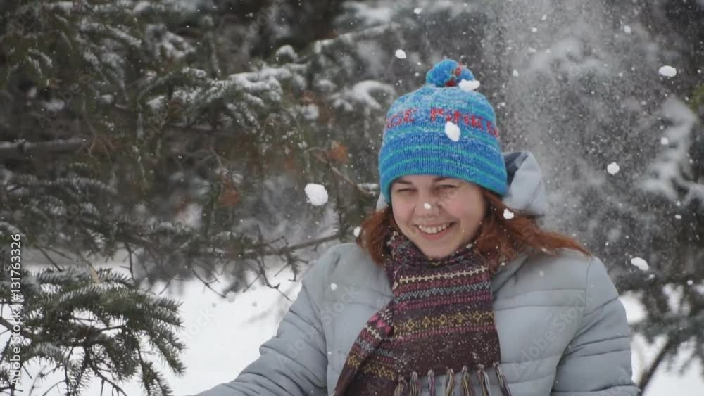 girl having fun in the winter park