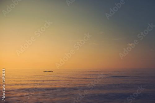Kayaking into the sunset © bartsadowski