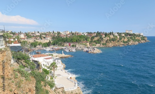 Fototapeta Naklejka Na Ścianę i Meble -  Antalya-Kaleici: Harbour and the old City Walls with the Mediterranian Sea, in Turkey