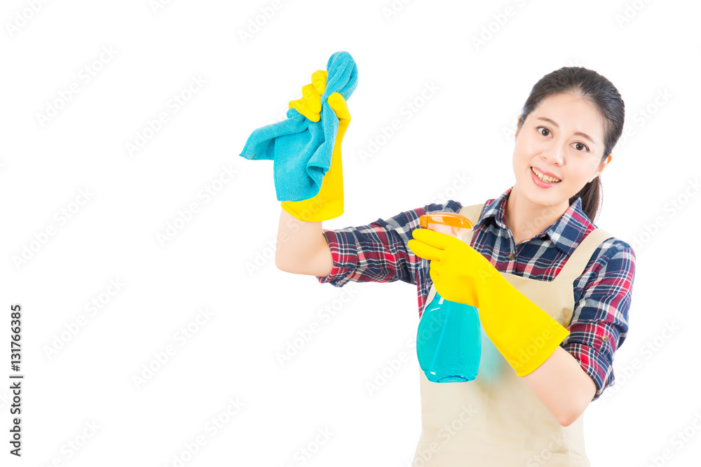 Housewife cleaning using the rag and spray Stock Photo | Adobe Stock