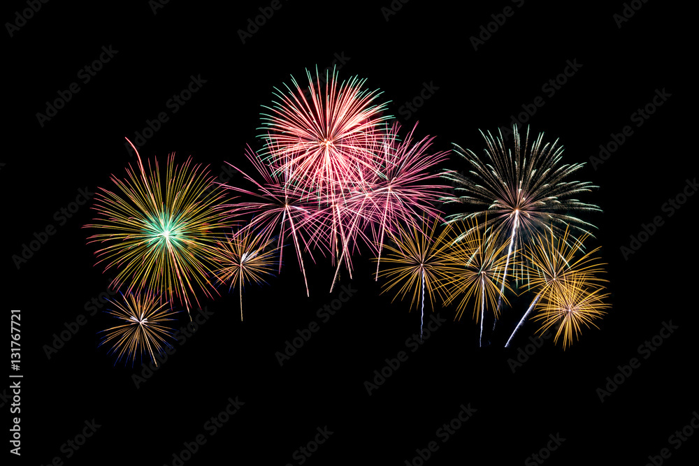 Fireworks of various colors isolated on black background