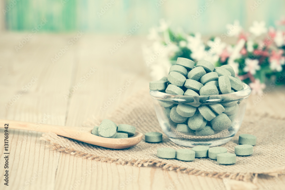 Herbal pill on bowl. herb for healthy living. Herbal pill on bowl. herb for healthy living.