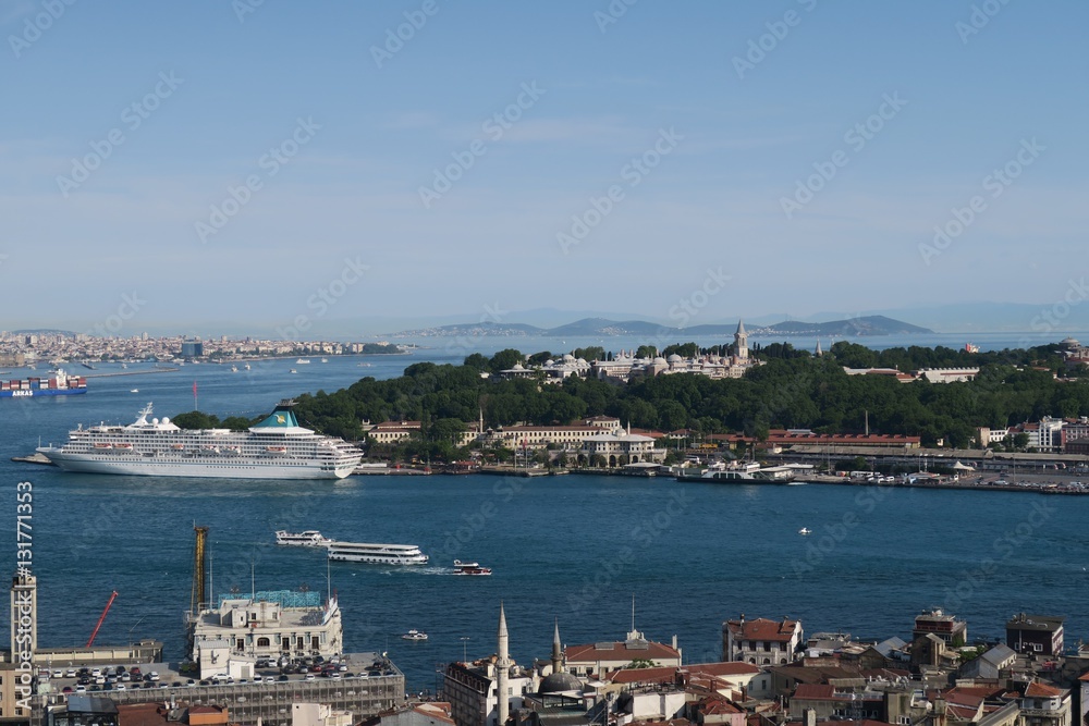 Topkapi Palace, Bosphorus, Golden Horn and a Cruise Ship, as seen from Galata in Istanbul, Turkey