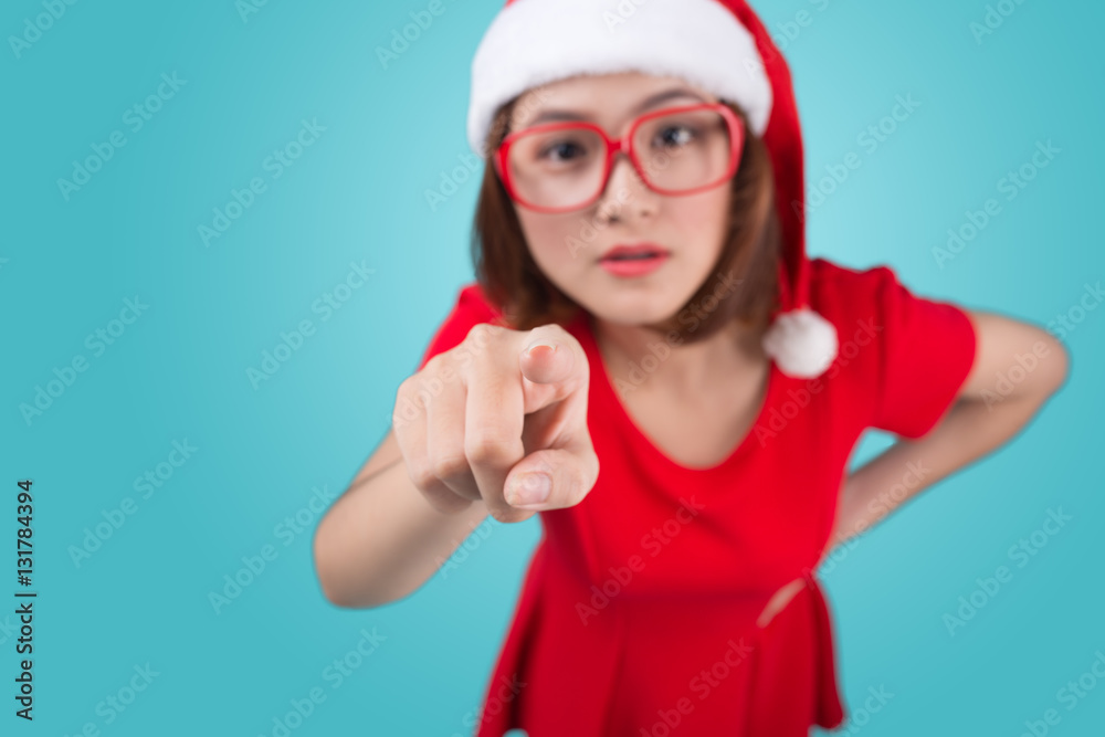 Smiling asian woman portrait with christmas santa hat isolated o Smiling asian woman portrait with christmas santa hat isolated o